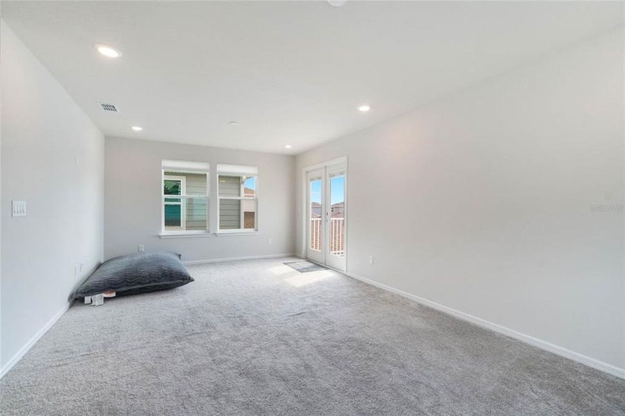 Spacious, unfurnished interior of a new home in Isles of Lake Nona, Orlando (Image 32).