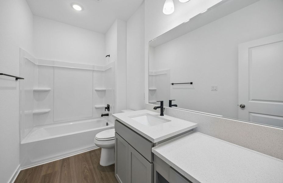 Furnished interior view inside a new home in Sunfield, Buda (Image 10).