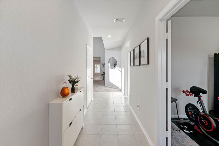 A dedicated study sits just off the entryway, offering a quiet retreat for work or reading. A dedicated study sits just off the entryway, offering a quiet retreat for work or reading.