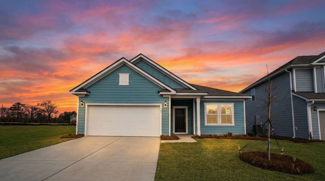 Front exterior of a new home in Monroe Preserve, Chapin, SC, highlighting curb appeal (Image 23).