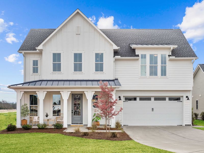 Representative exterior photo of a completed home built from the The Highland by RobuckHomes in WyndWater, Hampstead, NC (Image 27). Representative exterior photo of a completed home built from the The Highland by RobuckHomes in WyndWater, Hampstead, NC (Image 27).
