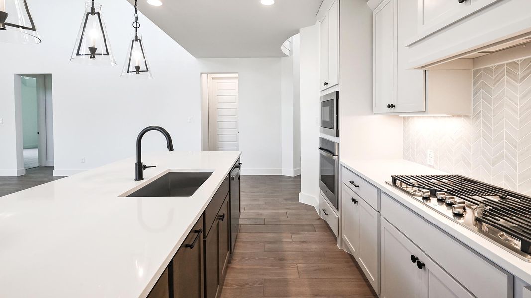 Furnished interior view inside a new home in 6 Creeks 60', Kyle (Image 10).