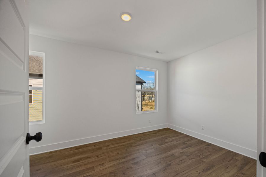 Representative unfurnished interior of a home built from the Gayle Townhome by Parkside Builders in The Parks of Mill Town, Chattanooga (Image 31).
