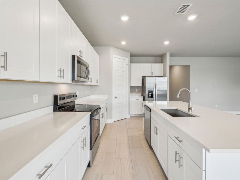 Furnished interior view inside a new home in Brystol at Wylder - Reserve Series, Port St. Lucie (Image 8).