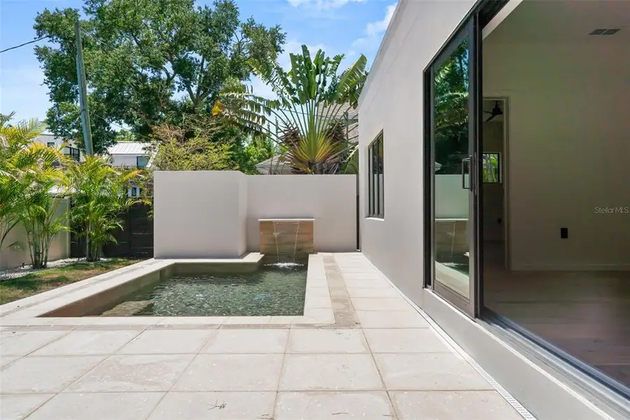 Exterior details and patio area of a home in , Sarasota (Image 36).