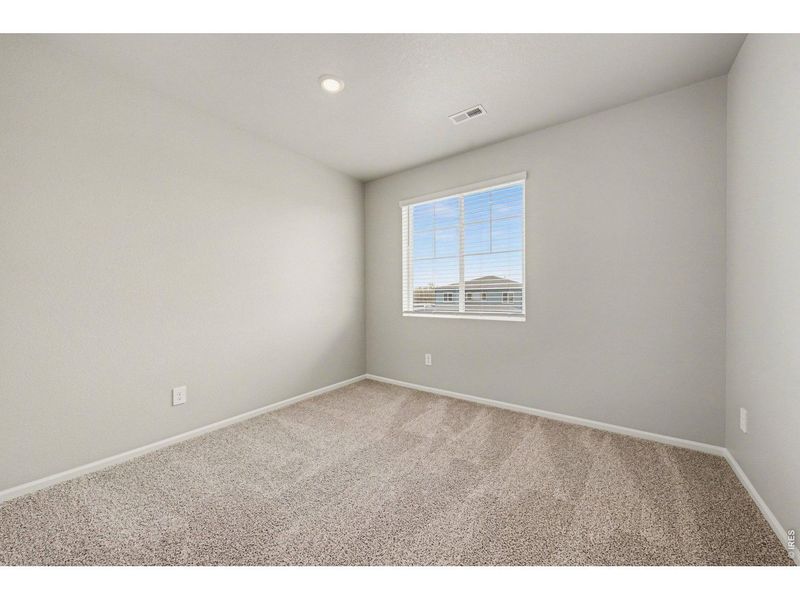 Spacious, unfurnished interior of a new home in Poudre Heights: The Alpine Collection, Windsor (Image 25).