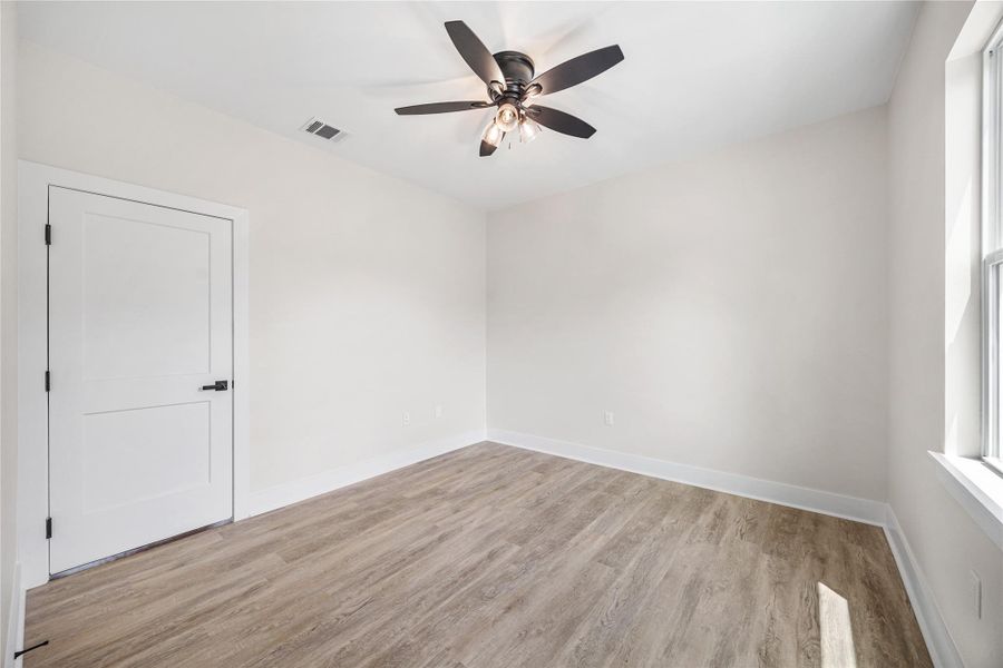 Home Office Space Offering Privacy and Attic Access/Storage.