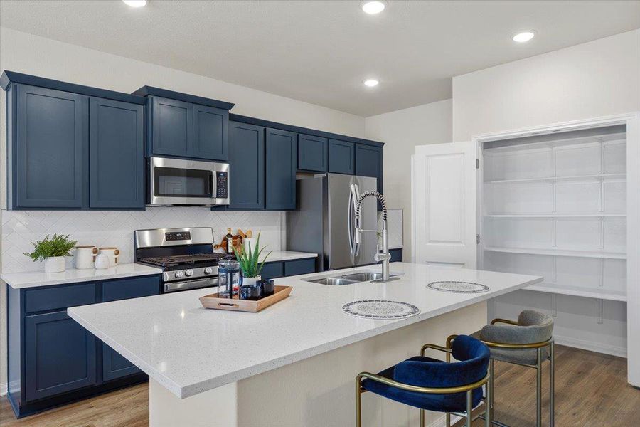 French doors open to a generous pantry.