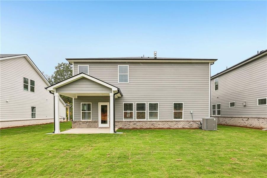 Exterior details and patio area of a home in Westmont Preserve, Powder Springs (Image 4).