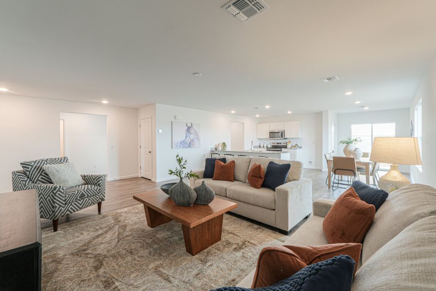 A living room with a couch and a coffee table.