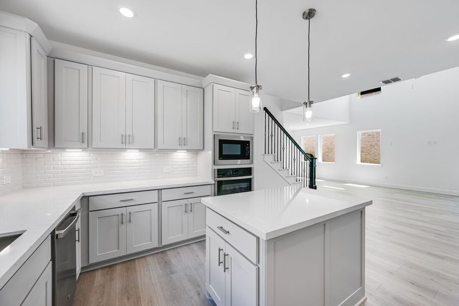 Representative furnished interior of a home built from the Camelia by Taylor Morrison in Stoneridge, Melissa (Image 11).