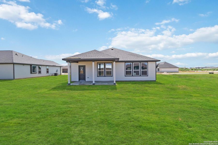 Front exterior of a new home in Bonita Vista, Pleasanton, TX, highlighting curb appeal (Image 17). Front exterior of a new home in Bonita Vista, Pleasanton, TX, highlighting curb appeal (Image 17).