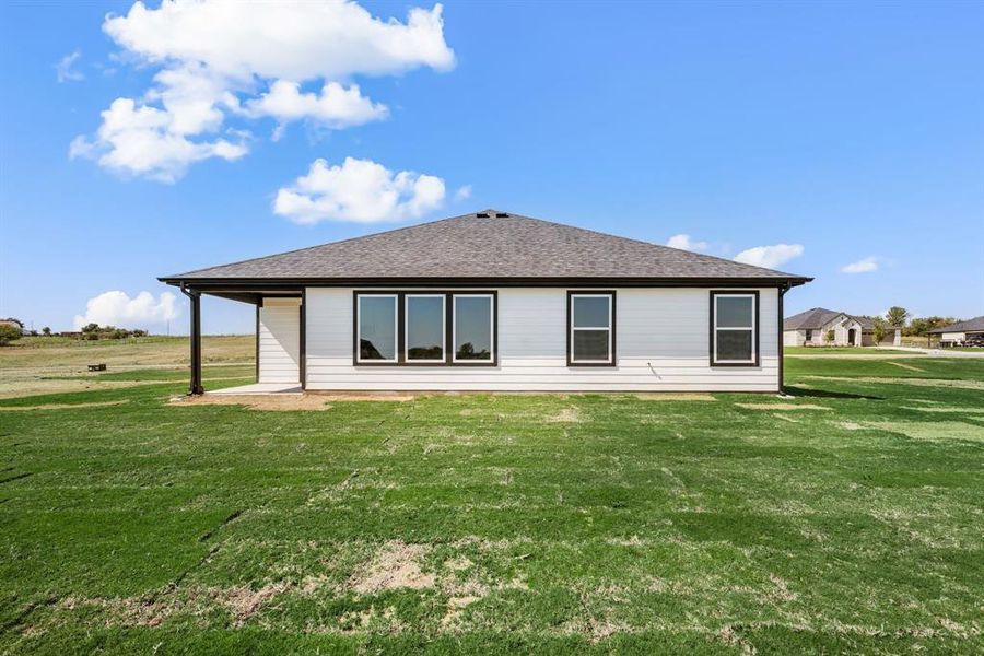 Exterior details and patio area of a home in Gatlin Ranch, Springtown (Image 4). Exterior details and patio area of a home in Gatlin Ranch, Springtown (Image 4).