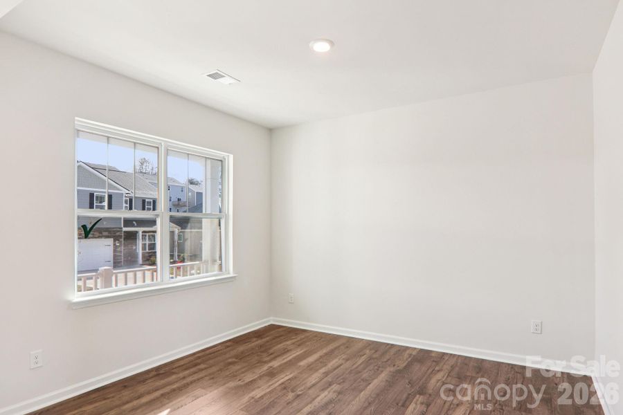 Spacious, unfurnished interior of a new home in Rydele Heights, Asheville (Image 31).