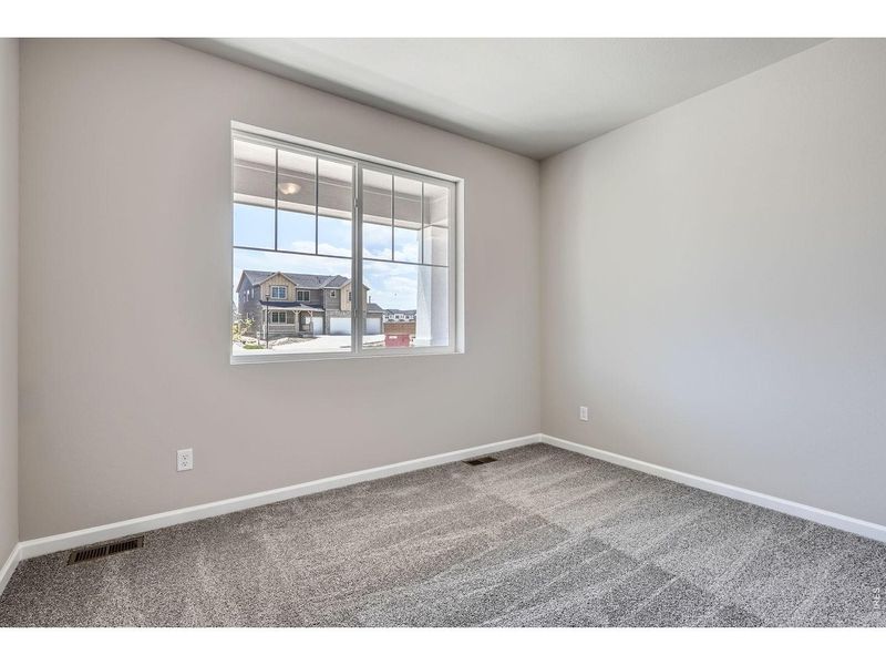 Spacious, unfurnished interior of a new home in Farmstead, Berthoud (Image 28).