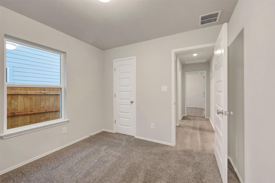 Spacious, unfurnished interior of a new home in Heritage, Dripping Springs (Image 17).