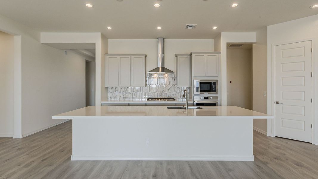 Furnished interior view inside a new home in Windrose, Waddell (Image 8).