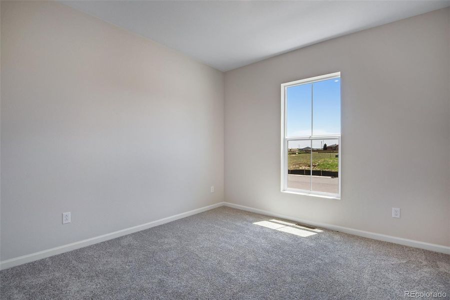 Spacious, unfurnished interior of a new home in Reunion Ridge, Commerce City (Image 29).