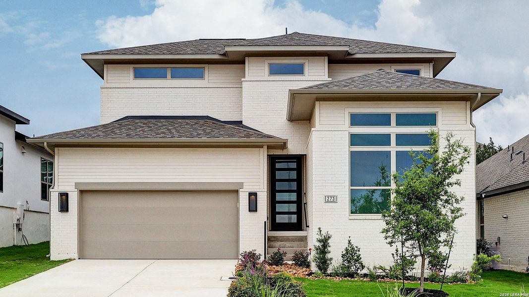 Front exterior of a new home in Esperanza, Boerne, TX, highlighting curb appeal (Image 1). Front exterior of a new home in Esperanza, Boerne, TX, highlighting curb appeal (Image 1).