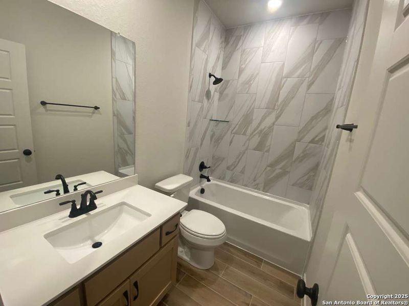 Furnished interior view inside a new home in Stream Waters, Seguin (Image 6).