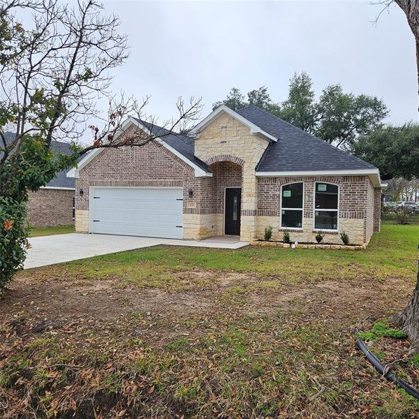 Front exterior of a new home in , Kaufman, TX, highlighting curb appeal (Image 16).