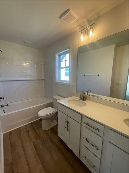 Furnished interior view inside a new home in Springwood Grove, Central (Image 6).