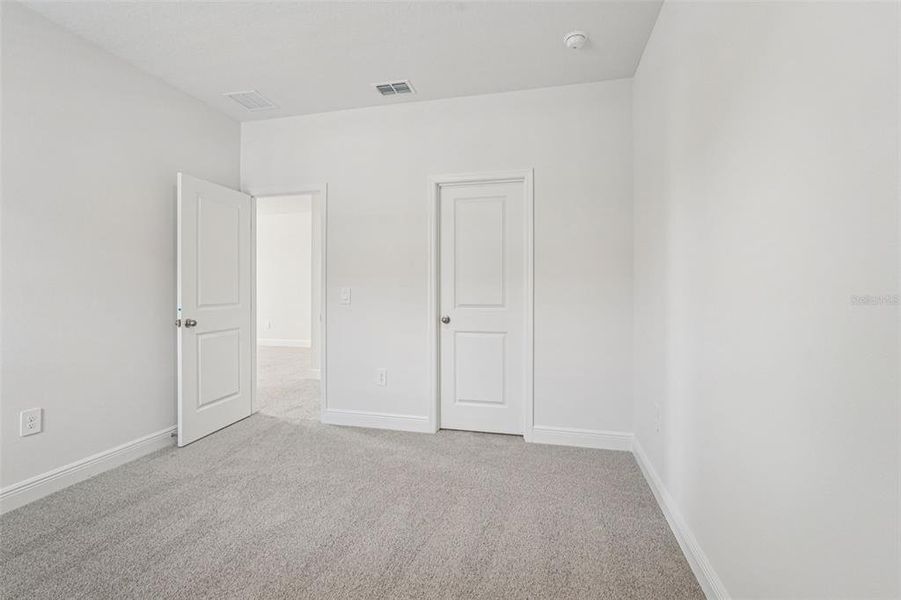 Spacious, unfurnished interior of a new home in Cyrene at Minneola, Minneola (Image 29). Spacious, unfurnished interior of a new home in Cyrene at Minneola, Minneola (Image 29).