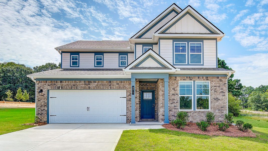 Representative exterior photo of a completed home built from the Wynwood by DRB Homes in Abbotts Crossing, Conyers, GA (Image 25).