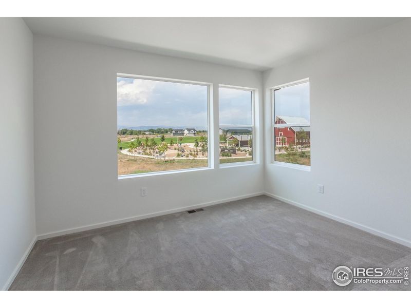 Spacious, unfurnished interior of a new home in Trailside Alley Load - Single Family Homes, Timnath (Image 34).