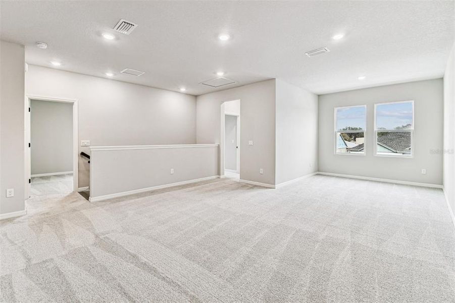 Spacious, unfurnished interior of a new home in Oakfield at Mount Dora Village Series, Mount Dora (Image 29).
