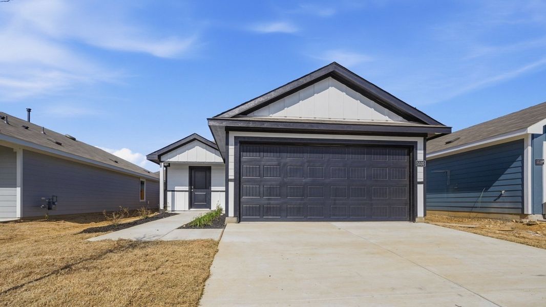 Representative exterior photo of a completed home built from the Estero by D.R. Horton in Sunnycreek, Crowley, TX (Image 2).