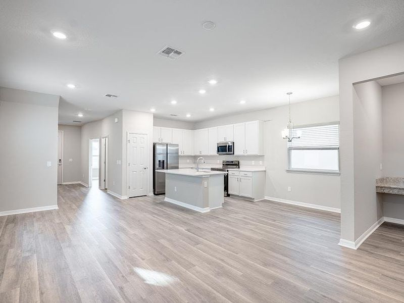 Enjoy a sunny, open living area - Capri bungalow by Highland Homes