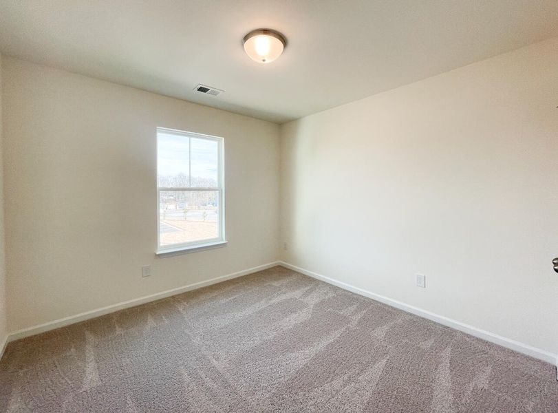 Spacious, unfurnished interior of a new home in Bellevue Townhomes, Greenville (Image 17).