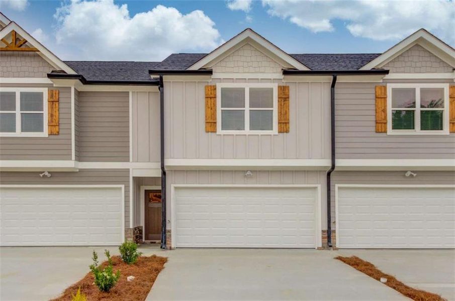 Front exterior of a new home in , Lula, GA, highlighting curb appeal (Image 1).