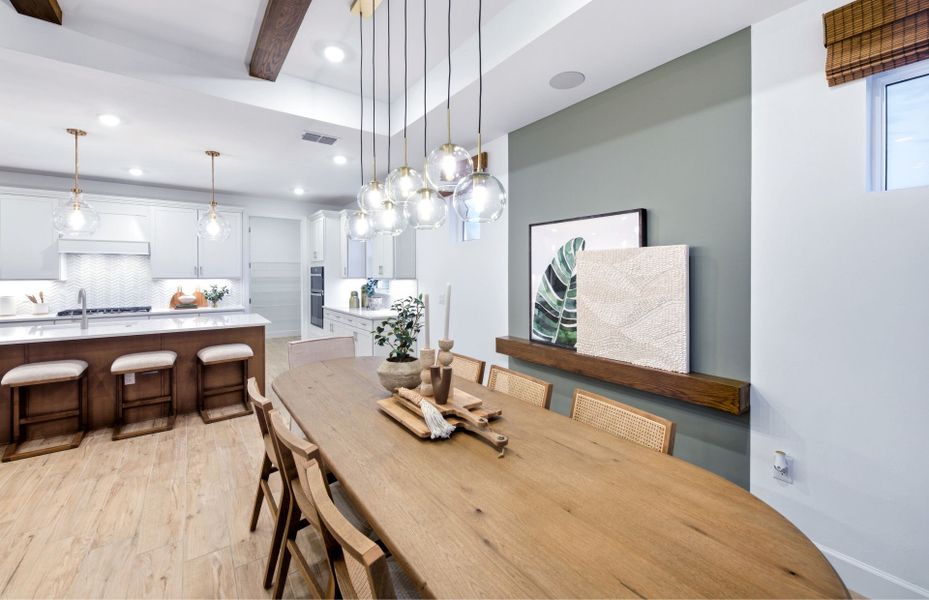 Representative furnished interior of a home built from the Palmary by DiVosta in BeachWalk by Manasota Key, Englewood (Image 19).