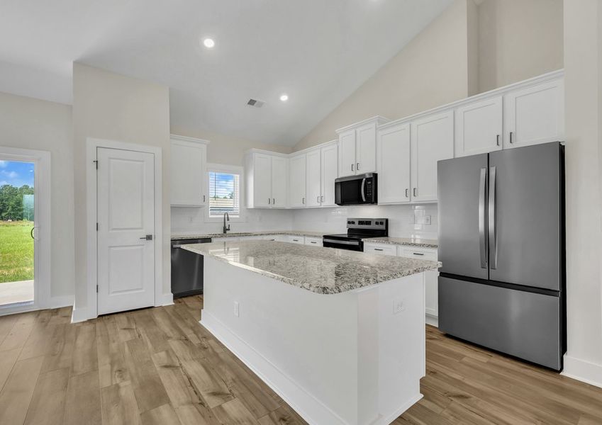 The kitchen comes with brand-new stainless-steel appliances.