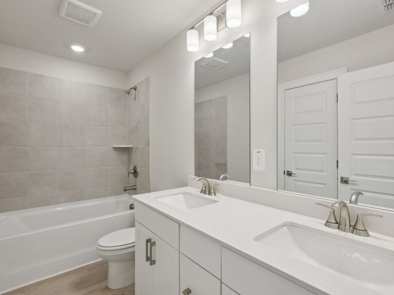 Furnished interior view inside a new home in Hemingway - Highland Series, Cumming (Image 11). Furnished interior view inside a new home in Hemingway - Highland Series, Cumming (Image 11).