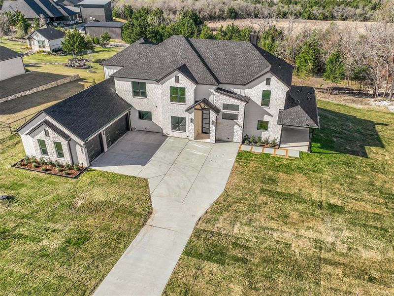 Front exterior of a new home in , Gunter, TX, highlighting curb appeal (Image 27).