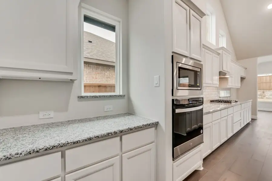 Furnished interior view inside a new home in Nelson Lake, Rockwall (Image 4).