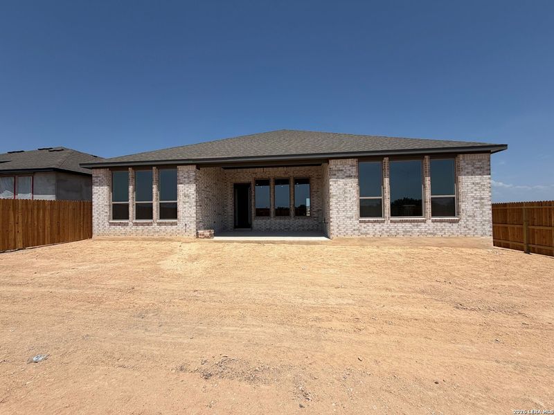 Exterior details and patio area of a home in Ladera - 60s, San Antonio (Image 3).