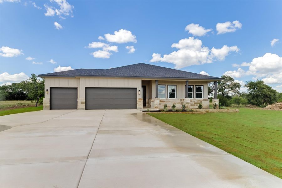 Front exterior of a new home in , Bertram, TX, highlighting curb appeal (Image 2).
