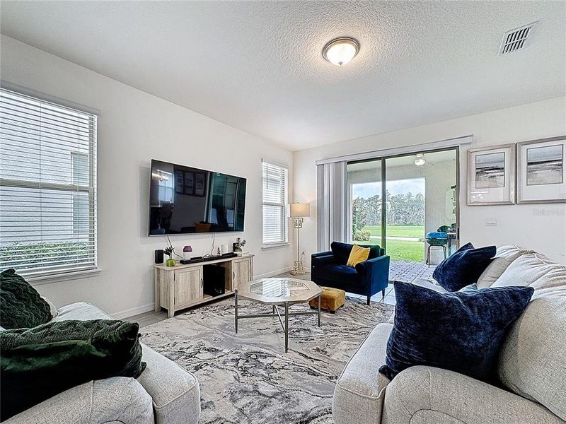 Furnished interior view inside a new home in , Winter Garden (Image 40).