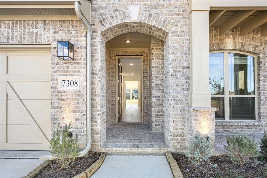 Exterior details and patio area of a home in Union Park Classic 55, Little Elm (Image 27).