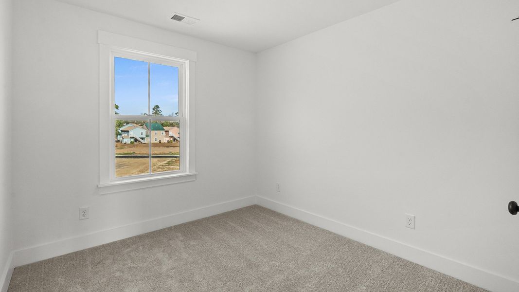 Furnished interior view inside a new home in Seabreeze Crossing, Little River (Image 18).