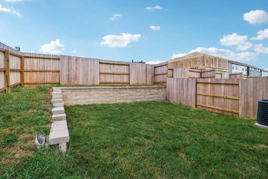 Representative exterior details of a home built from the The Kennedy by Rosehaven Homes in Magnolia Village North, San Antonio (Image 19).