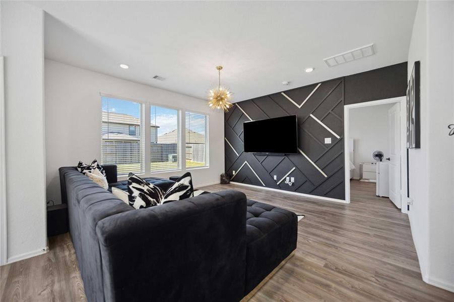 Family room with elegantly updated accent wall