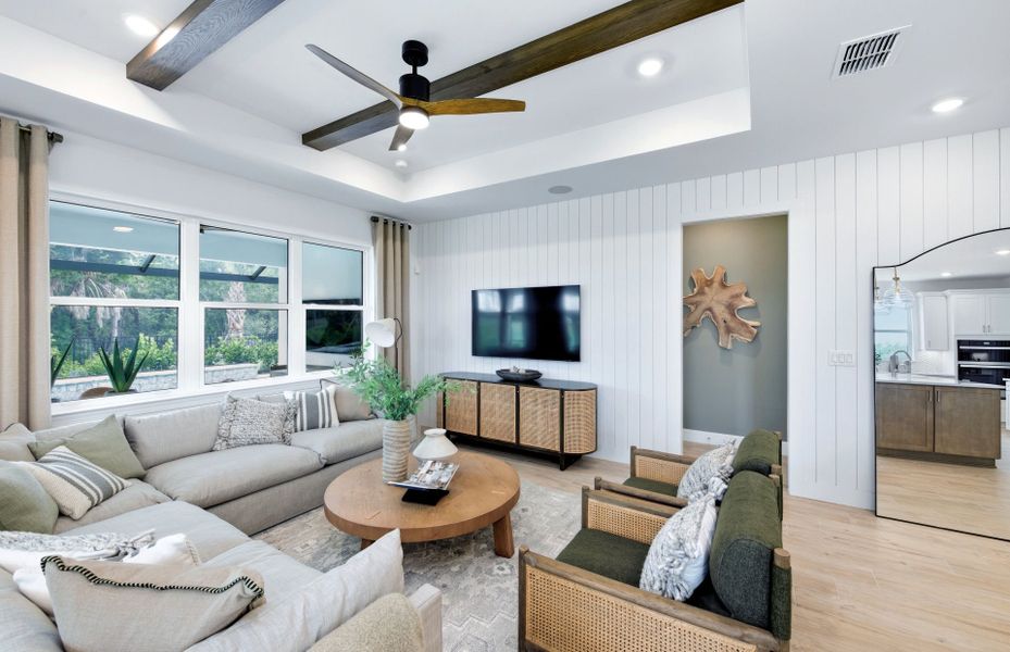 Representative furnished interior of a home built from the Palmary by DiVosta in BeachWalk by Manasota Key, Englewood (Image 6).