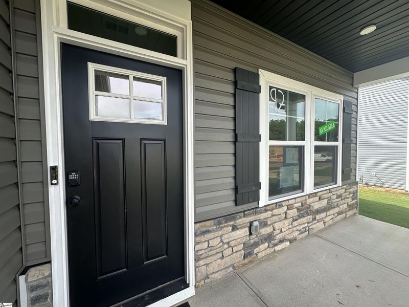 Front exterior of a new home in Shiloh Trail, Wellford, SC, highlighting curb appeal (Image 23). Front exterior of a new home in Shiloh Trail, Wellford, SC, highlighting curb appeal (Image 23).