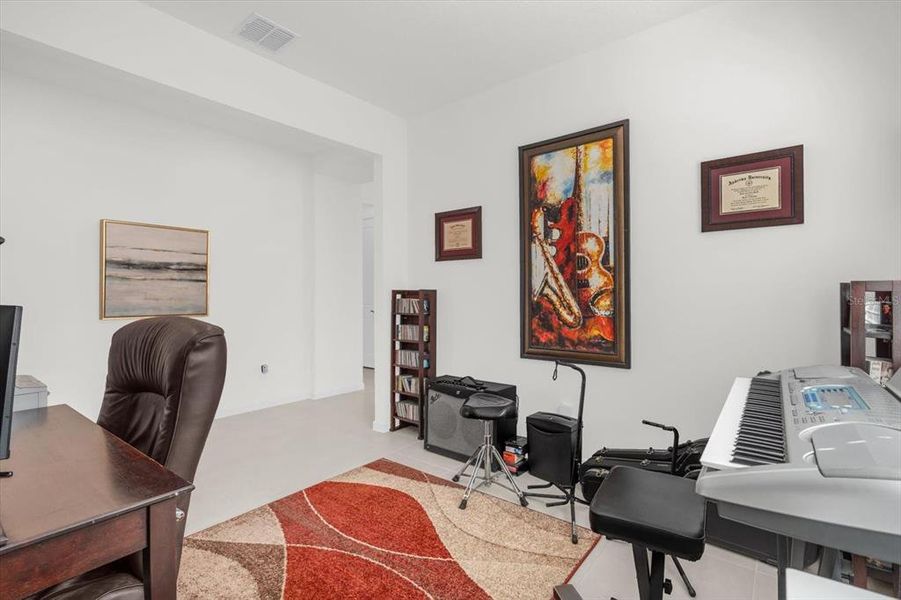 Furnished interior view inside a new home in Tohoqua Reserve, Kissimmee (Image 23).