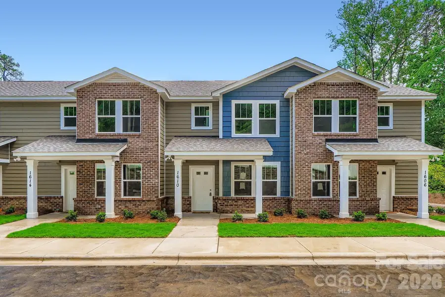 Front exterior of a new home in , Charlotte, NC, highlighting curb appeal (Image 27).